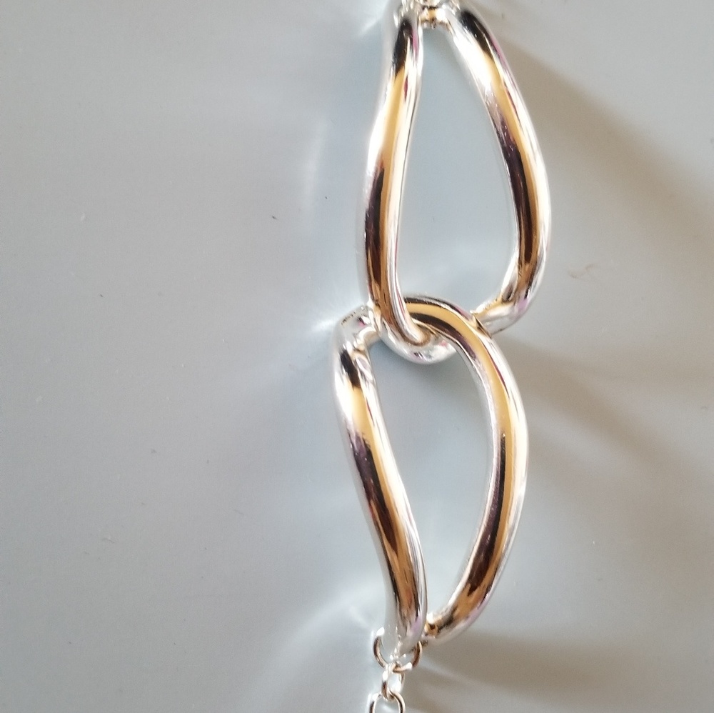 Silver tone loop bracelet